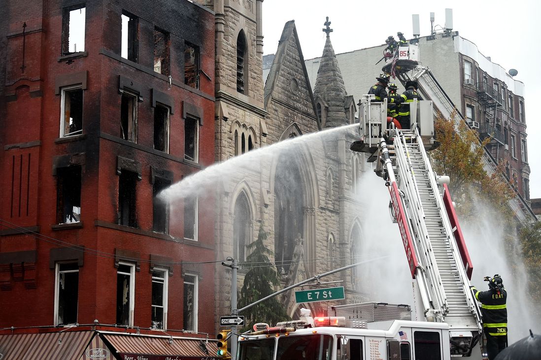 Firefighters continue to extinguish the six-alarm fire the destroyed the Middle Collegiate Church in NYC.